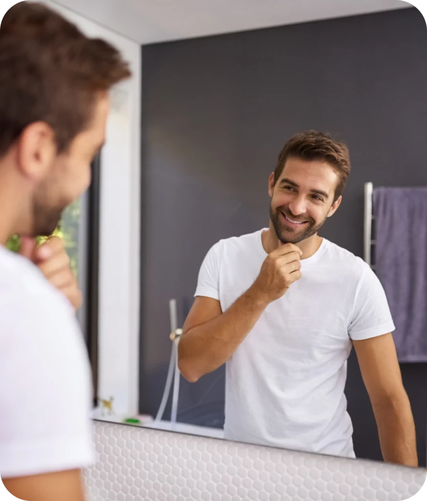 image of a man look good with beard looking at mirror